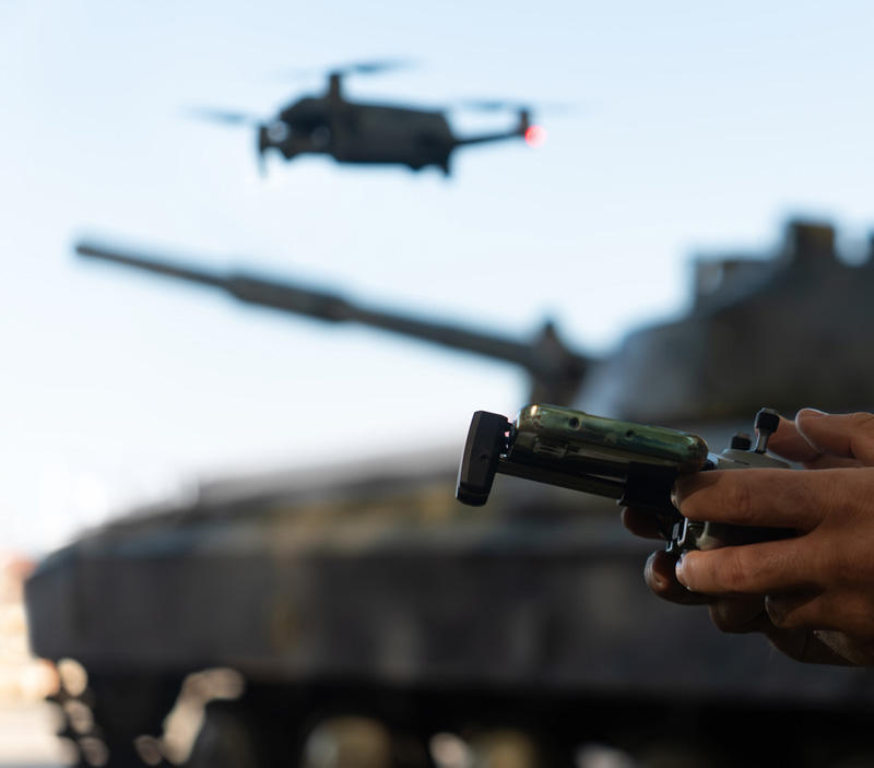 a close up of a person holding a gun